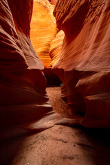 Antelope Slot Canyons in Arizona shows the orange bouncing light on the walls of the passageway.