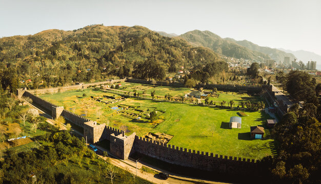 Aerial fly over top view historical site Gonio fortress - Roman fortification in Adjara, Georgia. Gonio-Apsaros Fortress