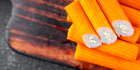 crab stick stuffing cream cheese and herbs natural fresh appetizer meal food snack on the table copy space food background rustic top view © Alesia Berlezova