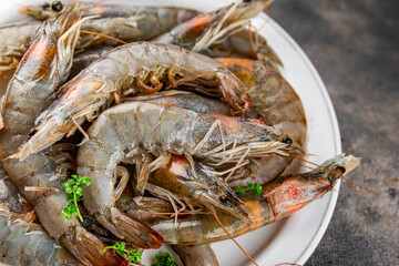 shrimp raw seafood prawns natural food fresh appetizer meal food snack on the table copy space food background rustic keto or paleo diet Pescetarian