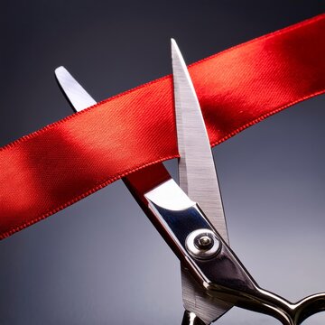 scissors cutting ribbon