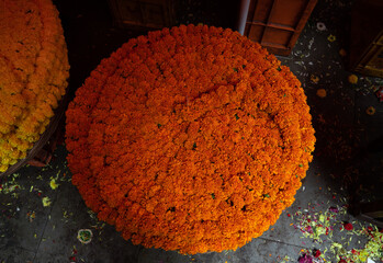 Orange marigold flower bunch in a flower market