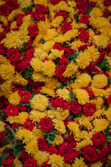 Yellow and Red roses bunch in a flower bouquet basket
