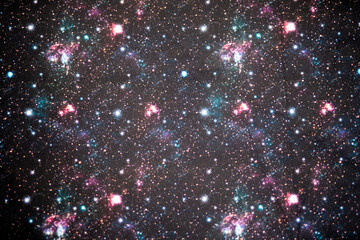 Fabric Pattern with Stars, Galaxies, and Nebulas on Black Background
