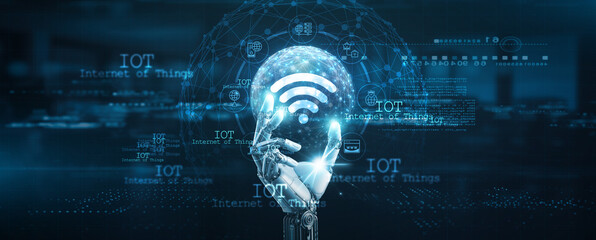 Internet of Things (IoT), Hands of robot hold Internet of Things network connection, data analytics, automation, and smart technology.
