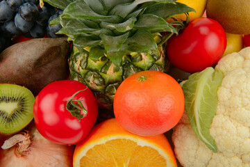 Assorted ripe fruits and vegetables. Food concept background.