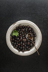 black currant on a light plate