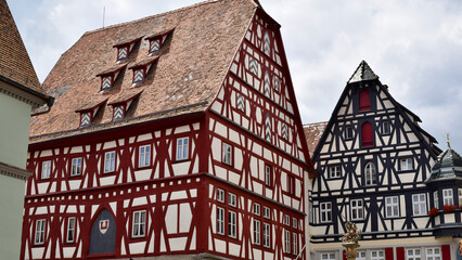 Large Half-Timbered German Houses, One with Red Beams, One with Blue, in Rothenburg
