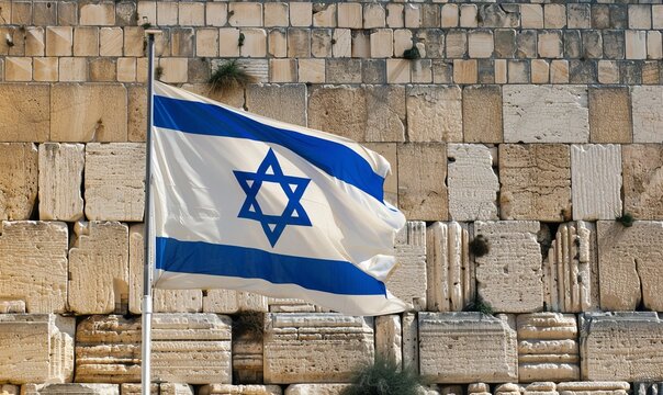 detailed photo of the israeli flag waving in front of the western wall in jerusalem with focus on architectural details