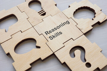 Puzzle pieces and one with words Reasoning skills.