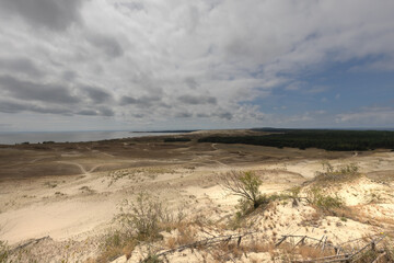 Sandy dunes and grass of the Curonian split ecosystem at the coast of Baltic sea