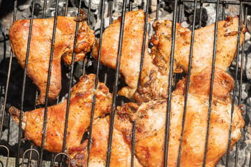 Close up Juicy Grilled Chicken on the BBQ, top view