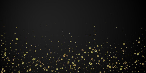 Gold sparkling star confetti.