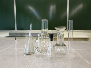 Chemical glassware in a chemistry lesson. Demonstration experience.