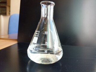 Chemical glassware in a chemistry lesson. Demonstration experience.