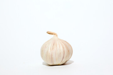 A Single Garlic on a White Background