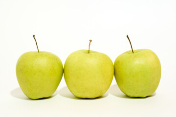 Three Green Apples Arranged Neatly