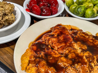 Breaded pork fritter, Brussels sprouts, and glazed beets for dinner