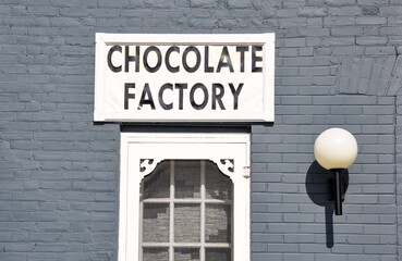 Chocolate factory sign in front of the building