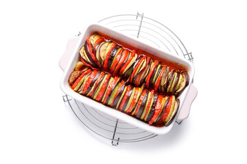 Baking dish of tasty Ratatouille on white background