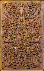 PERUGIA, ITALY - MAY 16, 2024: The detail of carved renaissance stalls in the church Cattedrale di San Lorenzo (St. Lawrece cathedral) by unknown artist. 