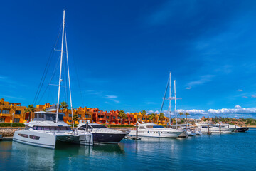 Fototapeta premium Marina de Portimao Portugal with boats, yachts blue sea and sky