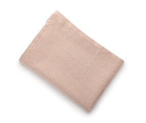 Fabric beige napkin on white background. Top view