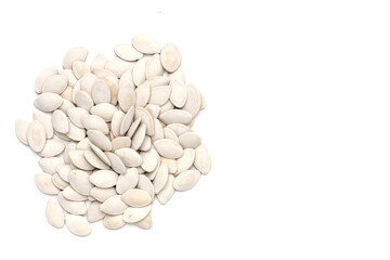 Pumpkin seeds on white background.