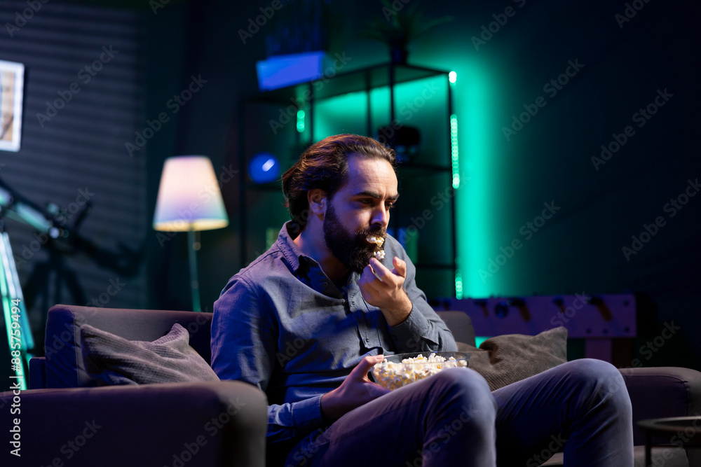 Poster lazy person lounged on couch using tv to binge series on subscription based streaming services, stuf