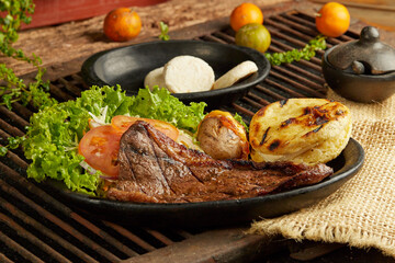 Grilled meat and salad