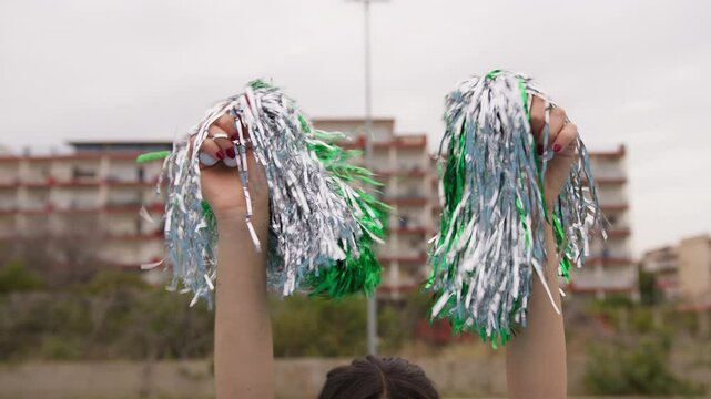 Cheerleader Girl Cheers Her Favorite Team By Doing A Ballet In The Field