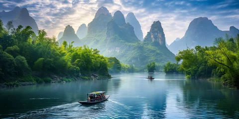Tourists relaxing on tourist boats are passing by karst mountains on the li river, xingping, china