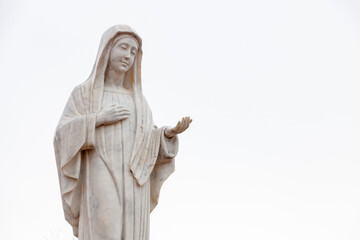 Statue of the Virgin Mary – Queen of Peace on Mount Podbrdo, the Apparition hill overlooking the village of Medjugorje in Bosnia and Herzegovina.
