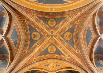 Fototapeta premium SPELLO, ITALY - MAY 18, 2024: The ceiling fresco in the church Chiesa di San Andrea by Benvenuto Crispoldi (1913).