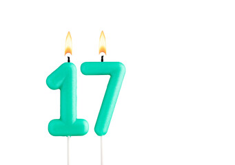 Birthday number 17 - Green birthday candle on white background