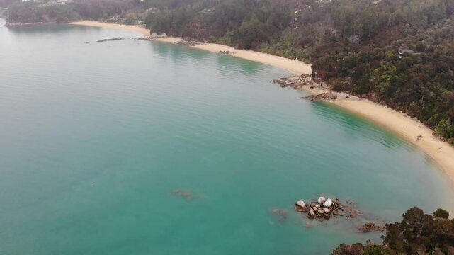 aerial panorama of split apple beach (towers bay) - famous bay with unique geological formation near abel tasman national park, new zealand south island
