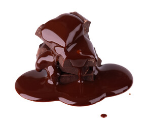 Chocolate pieces stack and chocolate syrup isolated on white background. Close up.