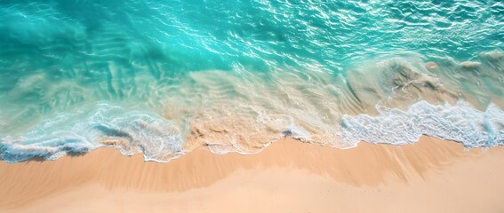 Obraz premium Aerial View of Empty Sandy Beach with Turquoise Water