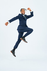 Full body photo of a jumping black businessman