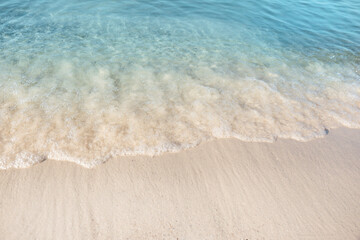 Sea waves rolling on beautiful sandy beach. Summer vacation