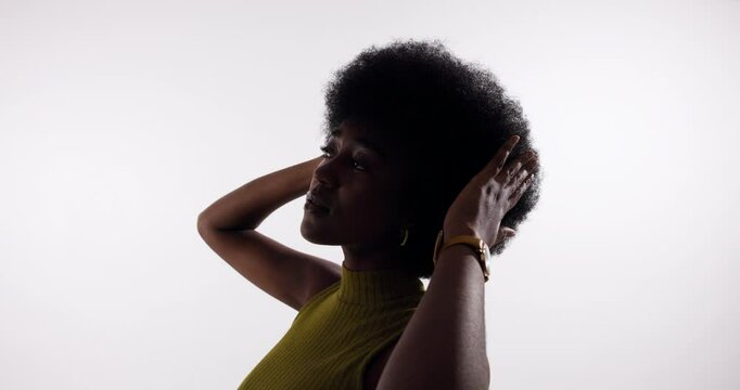 Beauty, afro hair and black woman in studio for natural cosmetics, wellness and scalp hydration results on white background. Haircare, texture and African girl model with shine, growth and pride