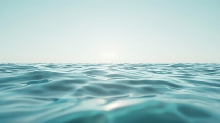 A vast ocean with a clear blue sky above it