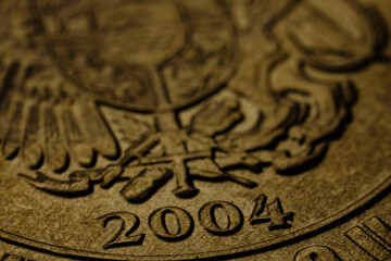 an old gold coin with the emblem of Armenia on it