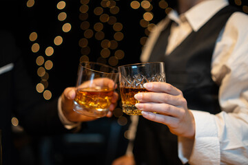 Celebrate whiskey on a friendly party in  restaurant.