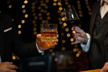 Celebrate whiskey on a friendly party in  restaurant.