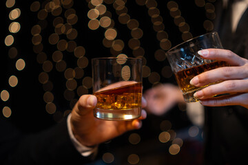 Celebrate whiskey on a friendly party in  restaurant.