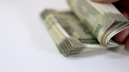 Close up view of flipping Indian 500 rupees pack, Budget concept .