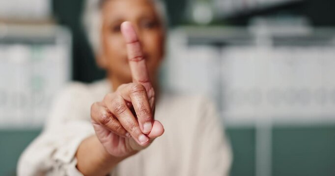 Hand, no and mature woman in classroom for feedback, wrong or rejection. Disagreement, female teacher and emoji or icon with finger for warning, show or sign for mistake or problem in academic centre