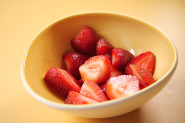  Ripe Red Strawberries in a bowl on table 