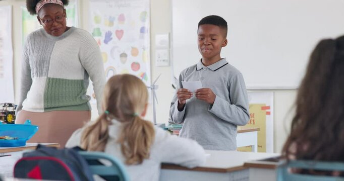School, education and child with presentation in classroom for lesson, learning and oral assessment. Teaching, students and kids listen to boy for public speaking, speech development or show and tell